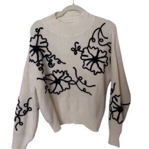 Embossed flower sweater